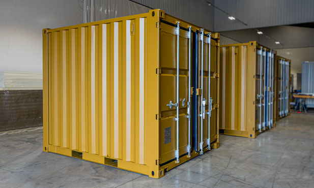 Spray painting shipping containers