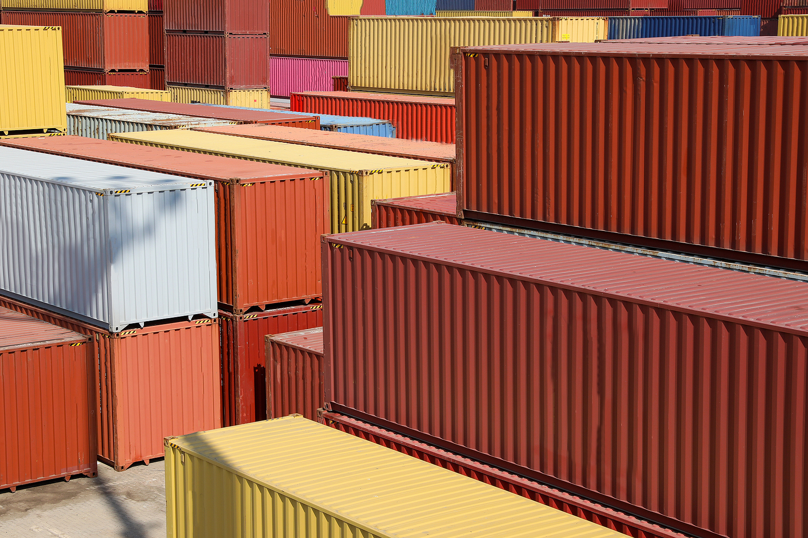 Stack Of Containers In A Harbor. Freight Containers Are Used For