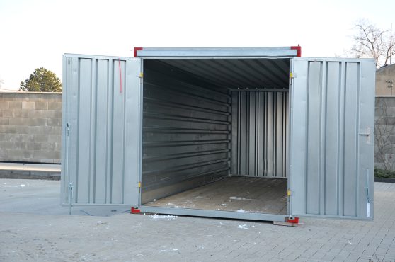 In The Yard There Is A Large-capacity Container With A Wooden Fl