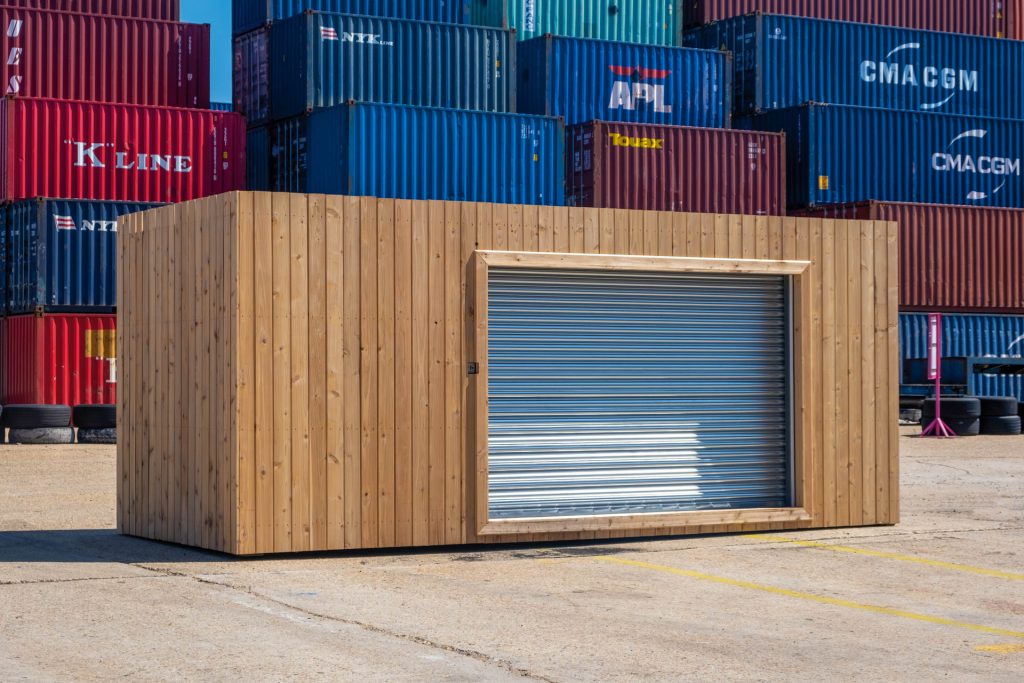 Shipping Container with Roller Door and Cladding